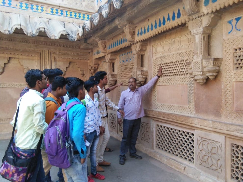 Assorted plants in a jar.